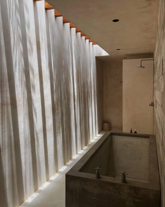 Light through the slats onto the concrete bath, Lunaya 4